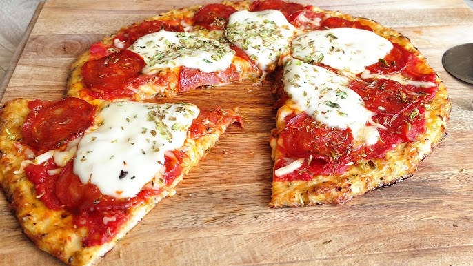 Pizza de coliflor y parmesano. Sabor y sencillez, serían las palabras perfectas para describir esta receta, a disfrutar amigos.